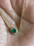 Diamond and emerald necklace pear-shaped emerald diamond halo necklace 10 K yellow gold necklace