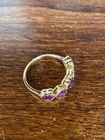 14 K purpleish, pink rhodolite Garnet, half eternity ring