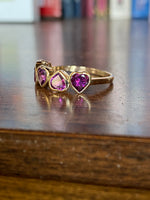 14 K purpleish, pink rhodolite Garnet, half eternity ring