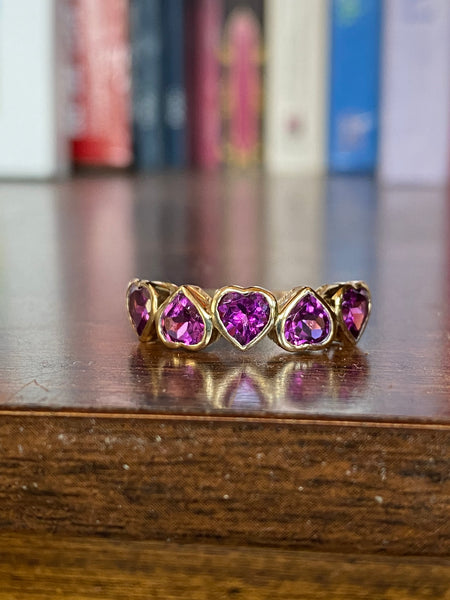 14 K purpleish, pink rhodolite Garnet, half eternity ring