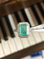 14K Gold Zambian Emerald and diamond halo Ring