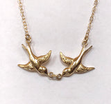 14K Yellow Gold Kissing Birds Sparrow and Diamond Eye accents .01 carat G SI diamonds necklace pendant