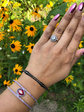 Ruby 5 carat pear shape 1 carat accent ruby blue sapphire halo double row cuff bracelet custom jewelry sterling silver custom