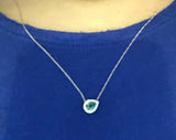 Gorgeous Emerald and diamond halo necklace .25 carat pear-shaped emerald .10 carat diamond halo yellow gold necklace