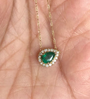 Gorgeous Emerald and diamond halo necklace .25 carat pear-shaped emerald .10 carat diamond halo yellow gold necklace